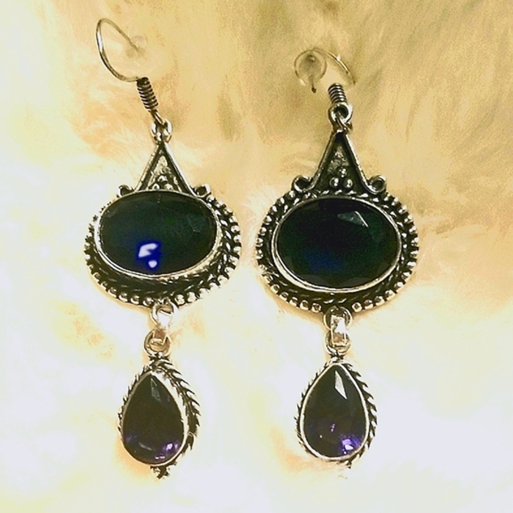 Tanzanite and Amethyst earrings. Beautiful design.
